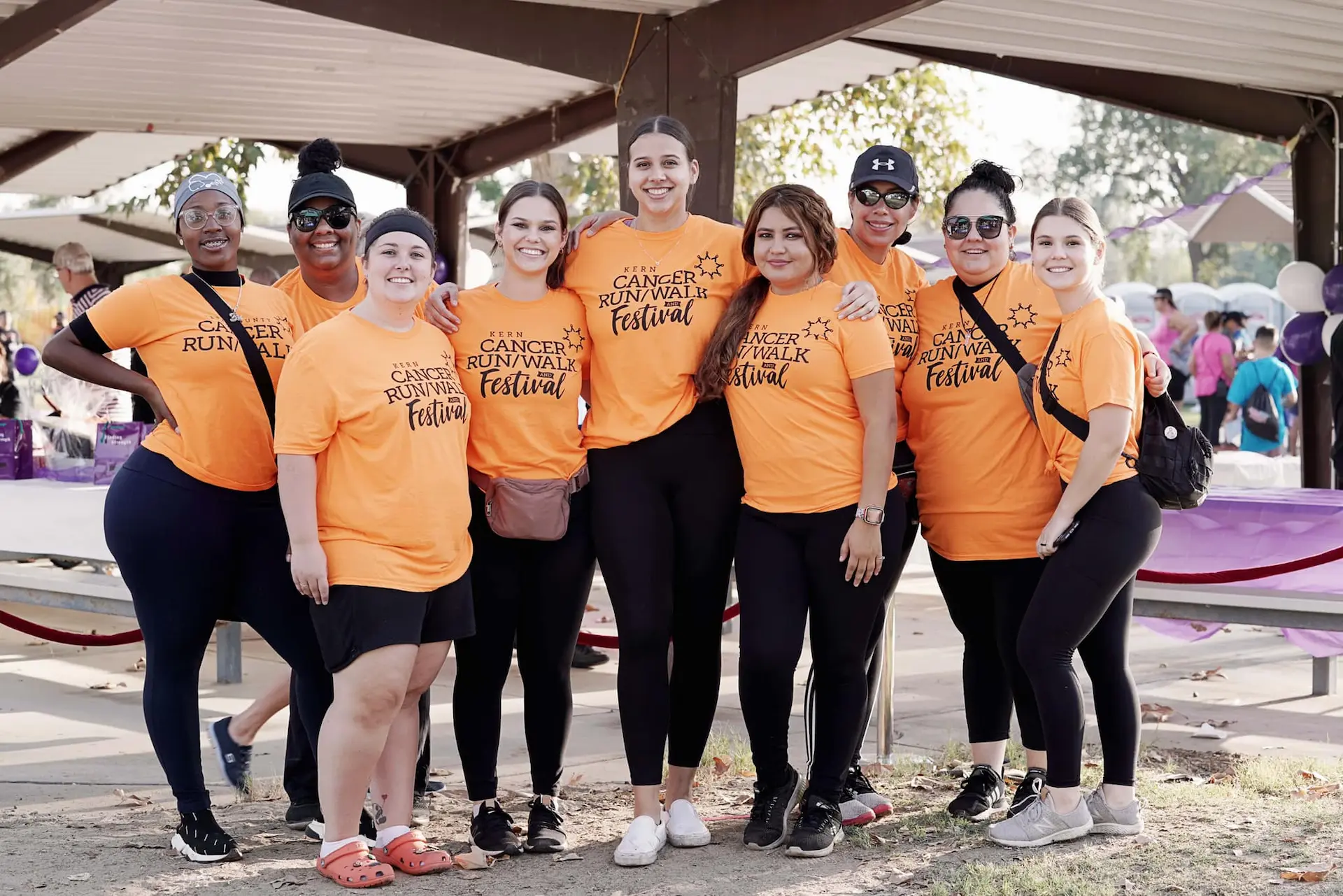 A group all wearing orange at the Kern Cancer Run Walk